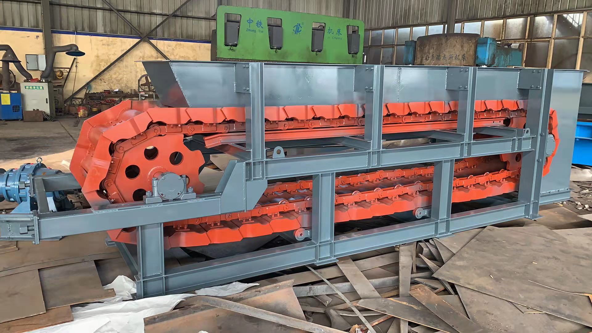 鏈板式輸送機(jī)工作原理